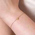 Gold Stainless Steel Tiny Round Heart Charm Bracelet on Model