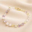 Pastel Semi-Precious Stone Beaded Bracelet in Gold on top of neutral coloured fabric