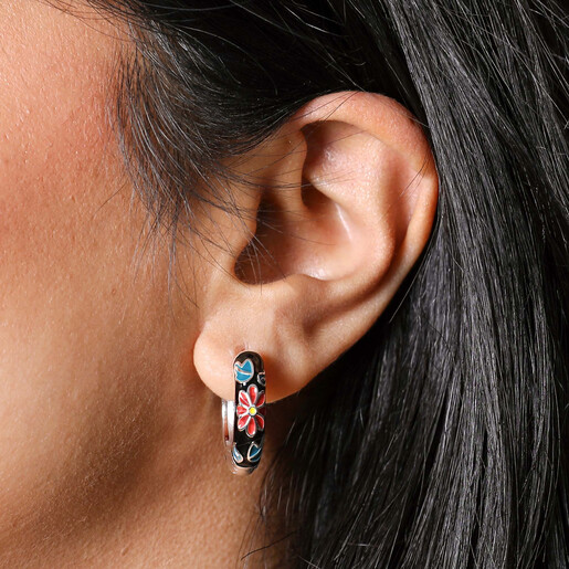 Close Up of Black Cloisonné Hoop Earrings in Silver on Model