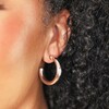 Close Up Model Shot of Stainless Steel Chunky Huggie Hoop Earrings