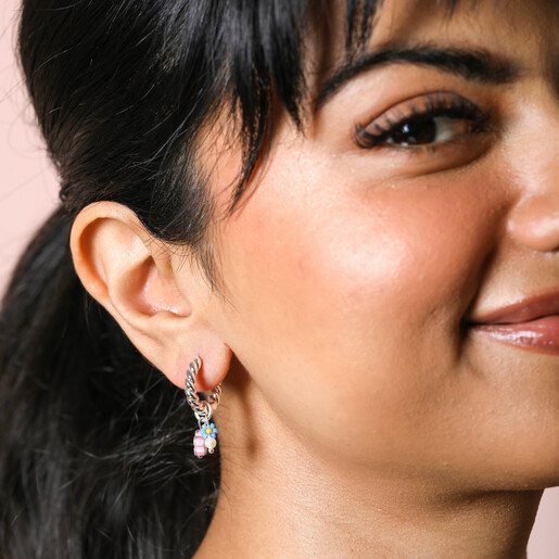 Model Wearing Millefiori Flower Bead Twisted Drop Huggie Hoop Earrings in Silver