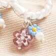 Close Up of Beads on Millefiori Flower Bead Twisted Drop Huggie Hoop Earrings in Silver