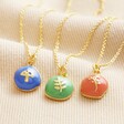Blue Enamel Organic Mushroom Pendant Necklace in Gold with Other Styles Available on Beige Fabric