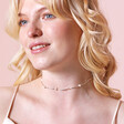 Freshwater Pearl Two Way Necklace and Bracelet in Silver on model as necklace against pink backdrop