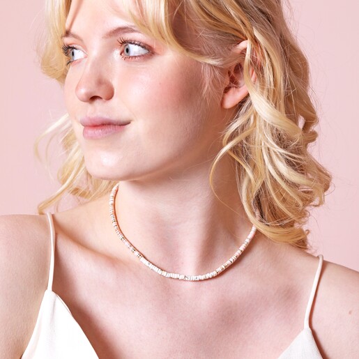 Necklace on Model Pink and White Semi-Precious Heishi Beaded Necklace on model with blonde hair against pink background
