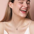 Personalised Sterling Silver Infinity Heart Pendant Necklace on model laughing in front of neutral backdrop