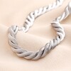 Stainless Steel Chunky Snakechain Necklace on Beige Background