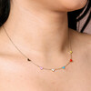 Close Up of Gold Stainless Steel Rainbow Enamel Tiny Heart Charm Necklace on Model