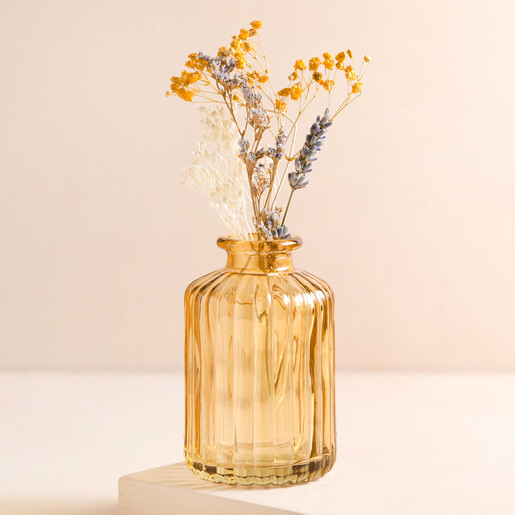 Amber Ribbed Glass Vase Amber Ribbed Glass Vase with an orange posy