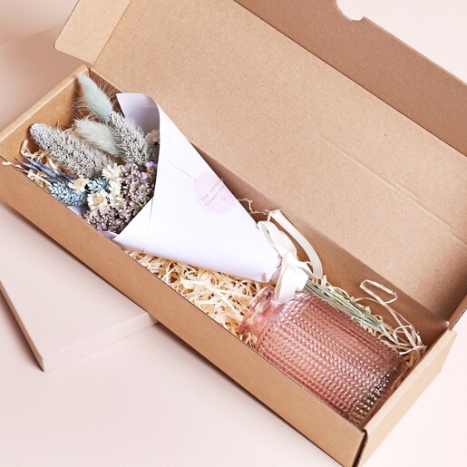 Spring Sunrise Dried Flower Posy with Vase inside of packaging