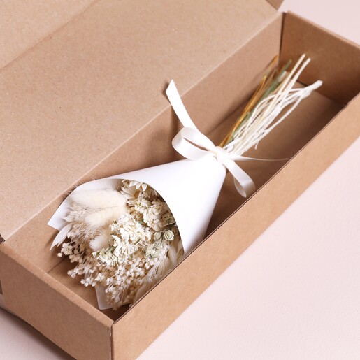 Fresh White Dried Flower Posy inside of packaging