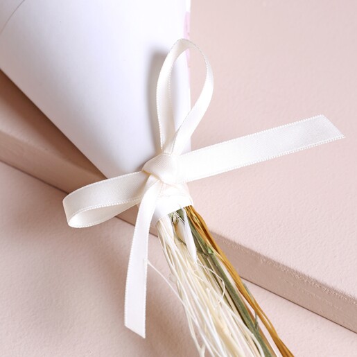 Close up of bow on Fresh White Dried Flower Posy