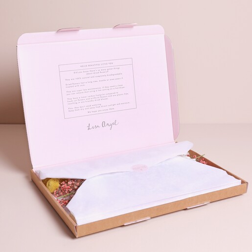 Peachy Haze Dried Flowers Letterbox Gift in packaging against beige background
