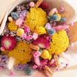 Close up of flowers inside of Luxury Rainbow Brights Dried Flower Bouquet