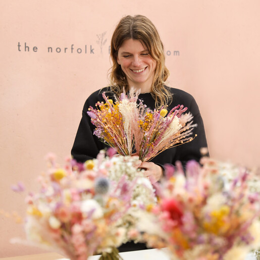 Model Arranging Flowers Model arranging wedding flowers in Nancy Dried Flower Bridal Wedding Bouquet