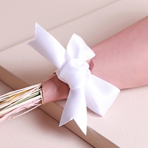 Close up of bow on Summer Sunshine Dried Flower Posy wrapping