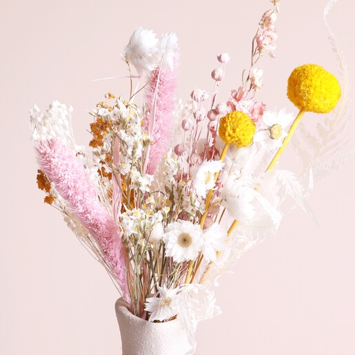 Close up of Summer Sunshine Dried Flower Posy arranged in vase