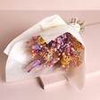 Betty Dried Flower Bridesmaid Wedding Posy on top of neutral backdrop