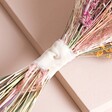 Close up of ribbon fastening on Betty Dried Flower Bridesmaid Wedding Posy