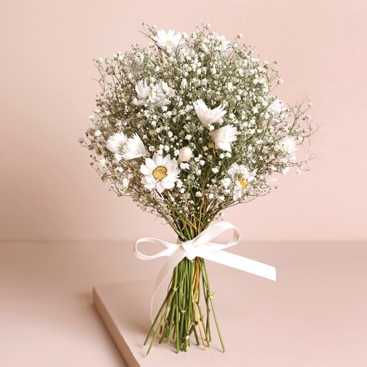 Dorothy Dried Flower Bridesmaid Wedding Posy standing against beige backdrop