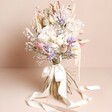 Margot Dried Flower Bridal Wedding Bouquet standing against beige coloured backdrop