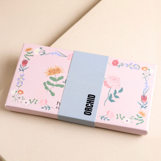 Outside of Hana Blossom Orchid Flower Scented Tealights on Pink