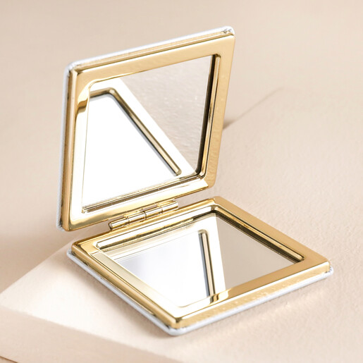 Open Mirror Just Bee You Daisy Compact Mirror Open on Beige Surface