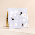 Just Bee You Daisy Compact Mirror Standing on Beige Platform