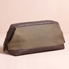 Men's Canvas Wash Bag in Brown against beige coloured backdrop