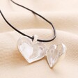 Close up of Chunky Heart Locket Cord Necklace in Silver on  model
