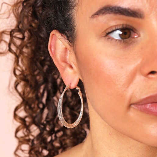 Close up of Triple Layered Thread Hoop Earrings in Silver on model