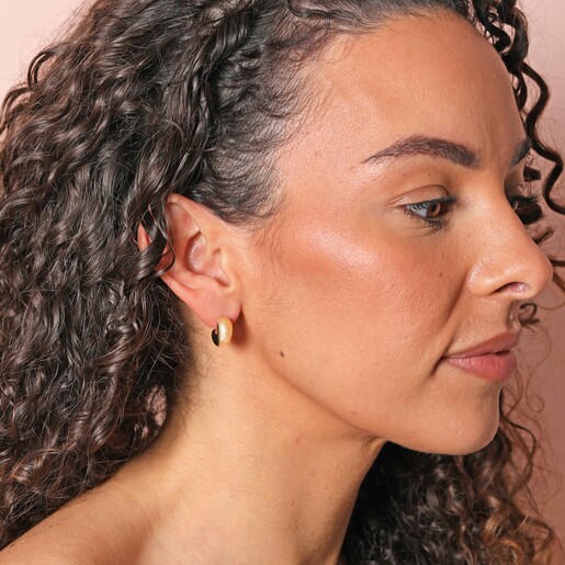 Small Chunky Half Hoop Earrings in Gold on Model