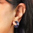 Close Up Model Shot of Blue Marbled Chunky Hoop Earrings in Gold