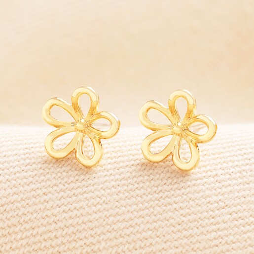 Delicate Outline Flower Stud Earrings in Gold with Flower Backs Delicate Outline Flower Stud Earrings in Gold with Flower Backs on a neutral background