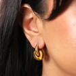 Tiger's Eye Loop Charm Huggie Hoop Earrings in Gold on model