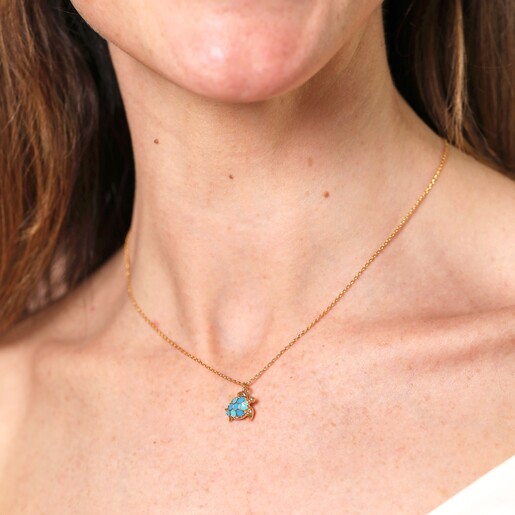Model shot Blue Turtle Pendant Necklace in Gold on a model