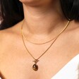 Semi-Precious T-Bar Tiger's Eye Layered Pendant Necklace in Gold on a model