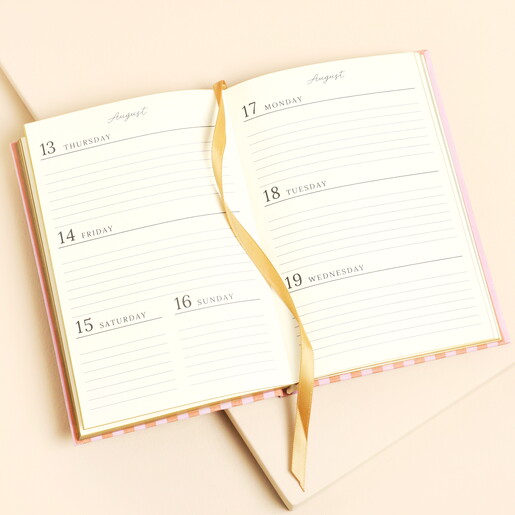 Open Page of 2026 Red and Pink Striped Diary