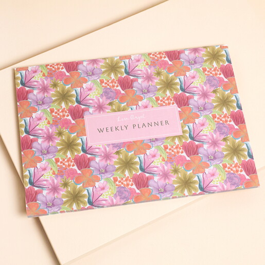 Bright Floral Desktop Weekly Planner on a neutral background