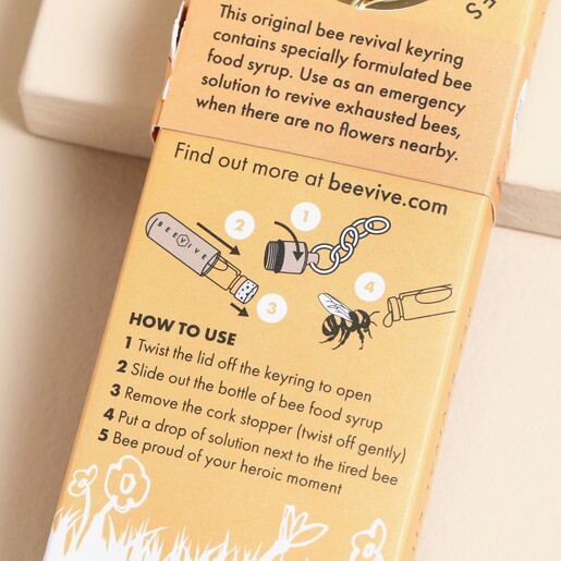 Packaging for the Beevive Bee Revival Kit Keyring in Gold