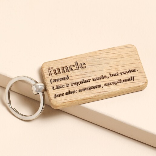 A sleek keyring made of durable oak wood