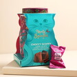 14 individually wrapped chocolates in a stunning collectable pink tin with floral illustrations and a large Persian cat