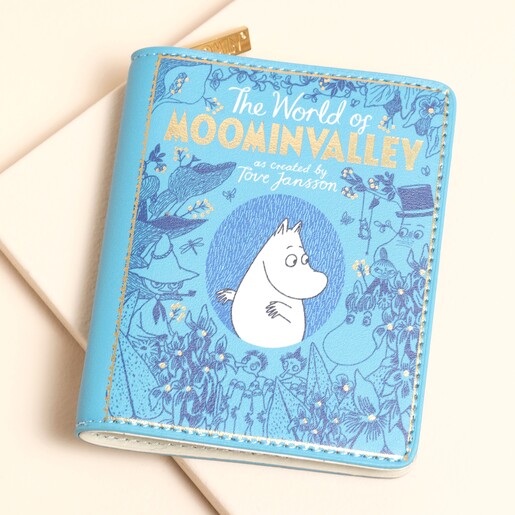 A blue book-shaped wallet with a Moomin design