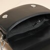 Close Up of Textured Vegan Leather Half Moon Crossbody Bag in Black