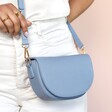 Model Shot of Vegan Leather Half Moon Crossbody Bag in Blue