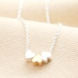 Estella Bartlett Multi Heart Bead Necklace on a neutral background