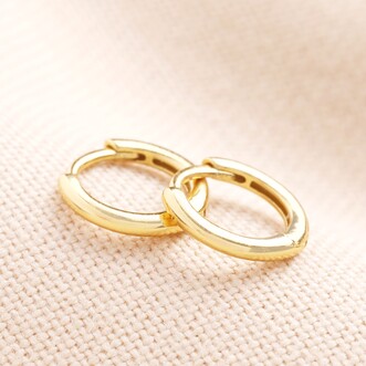 Tiny Sterling Silver Slim Huggie Hoop Earrings in Gold