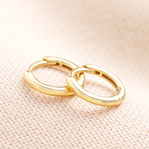 Tiny Sterling Silver Slim Huggie Hoop Earrings in Gold