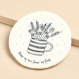 A large coaster made of white porcelain