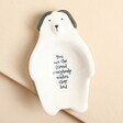 A dog-shaped porcelain trinket dish